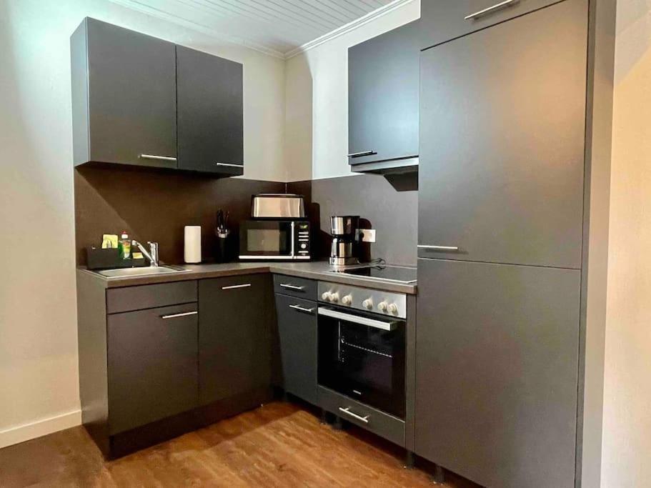 Studioappartement Mit Privatgarten In Ruhiger Wohnsiedlung Neumünster Екстериор снимка